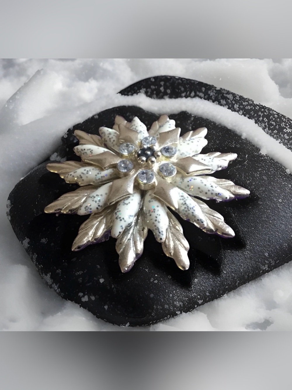 Vintage Silver and White Snowflake Brooch with Crystal Centers